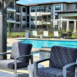 State-of-the-art amenities an outdoor sitting area poolside