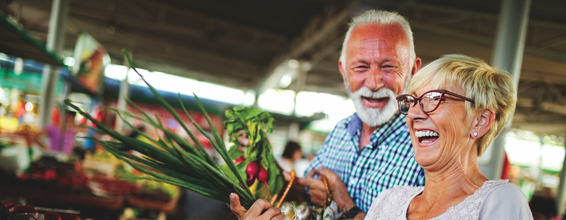 a couple at a farmers market